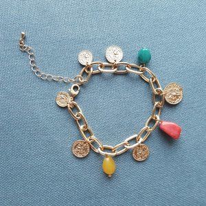 Gold toned bracelet with multi colored stones